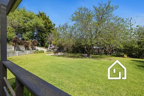 Fully fenced park-like gardens with abundant fruit trees