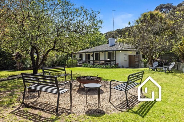 A quiet sanctuary, set amongst expansive private gardens with outdoor fire pit
