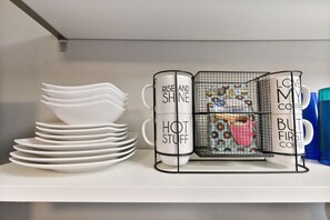Dishes and Mugs provided for your convenience.