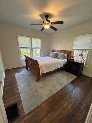 2nd bedroom with closet fan, queen bed
