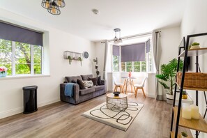 Spacious lounge / dining area with stunning garden view