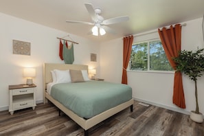 Upstairs Front Bedroom With Smart TV