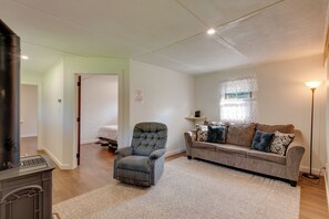 Living Room | Gas Fireplace | Flat-Screen TV | Queen Sleeper Sofa