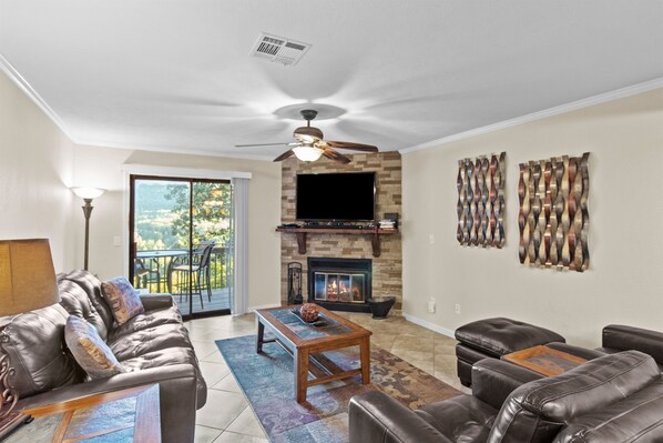 Living room with wood burning fireplace (wood not provided)