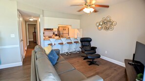 Living area with seating for four at counter