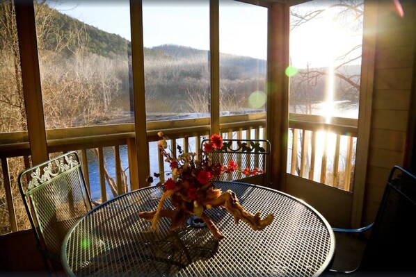Screened in porch overlooking Lake Taneycomo
