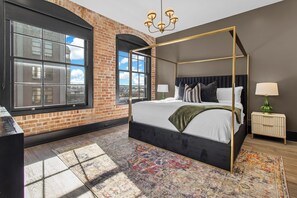 Retreat to the Primary bedroom with a plush king bed, walk-in closet, blackout shades, and a smart TV. Designed for comfort and privacy, this suite is perfect for recharging after a day exploring New Orleans.