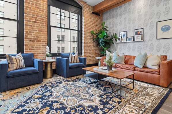 One of two living areas with queen sized sleeper sofa