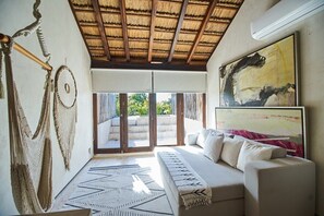 Third-floor living area and terrace.