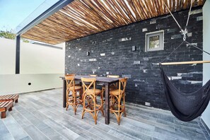Rooftop Terrace with Outdoor Dining Table & Hammock