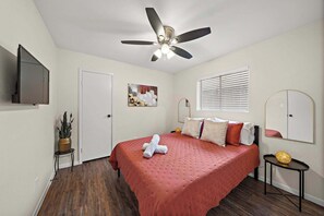 "Sleep soundly in this elegantly designed bedroom, offering the perfect blend of comfort and style. Equipped with plush bedding and tasteful furnishings, this space is ideal for relaxation and rejuvenation. Enjoy year-round comfort with air conditioning and heating, and bask in the peaceful ambiance. Just minutes from El Jardin Beach, this bedroom provides a serene escape for a restful stay."