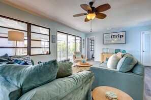 The living room becomes a cozy retreat as family and friends gather for a movie night, sharing laughter, snacks, and cherished moments together.