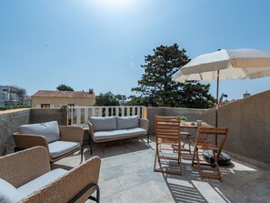 Sky, Furniture, Property, Building, Table, Shade, Outdoor Furniture, Chair, Interior Design, Outdoor Table