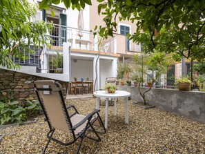 Plant, Building, Table, Furniture, Window, Chair, Tree, Outdoor Furniture, Wood, Flooring