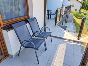 Furniture, Chair, Building, Shade, Interior Design, Wood, Outdoor Furniture, Flooring, Floor, Line