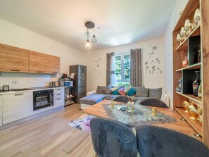 Furniture, Cabinetry, Table, Wood, Interior Design, Living Room, Flooring, Floor, Real Estate, Hardwood
