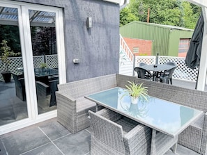 Furniture, Plant, Building, Table, Flowerpot, Chair, Outdoor Furniture, Window, House, Shade
