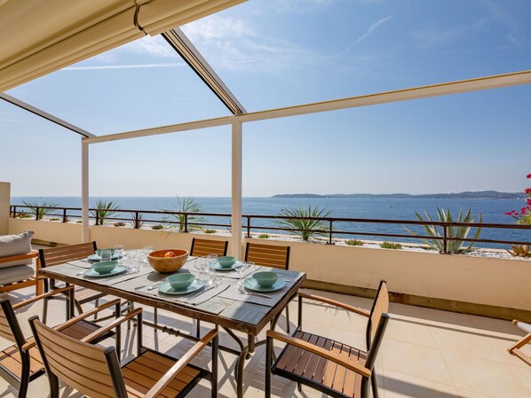 Water, Sky, Furniture, Table, Property, Building, Azure, Chair, Shade, Lighting