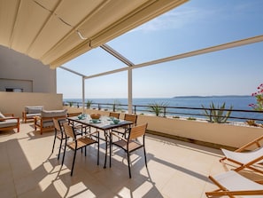 Sky, Furniture, Table, Property, Window, Building, Chair, Azure, Shade, Wood
