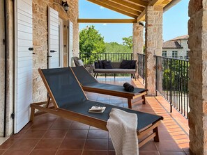 Property, Furniture, Sky, Building, Plant, Wood, Shade, Outdoor Furniture, Interior Design, Tree