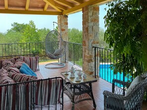 Furniture, Property, Plant, Table, Green, Chair, Wood, Outdoor Furniture, Porch, Interior Design