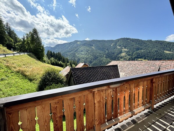Cloud, Sky, Property, Plant, Building, Mountain, Window, Wood, Architecture, Tree