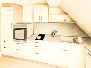 Wood, Flooring, Kitchen, Interior Design, Countertop, Furniture, Floor, Cabinetry, Ceiling, Room