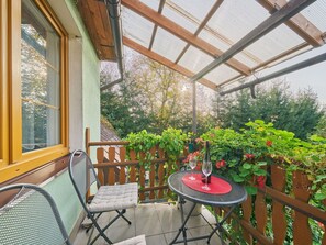 Plant, Table, Property, Flower, Furniture, Flowerpot, Window, Chair, Building, Shade