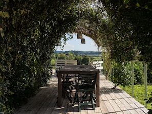 Plant, Furniture, Table, Shade, Building, Wood, Road Surface, Grass, Tree, Woody Plant