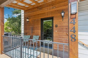 Porch seating at entrance.