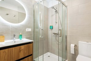 Fully Equipped Bathroom with walk-in Shower, Basin & Toilet
