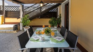 The outdoor dining area of Casa Dvi Mendule