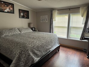 Master bedroom: King bed with attached full bathroom