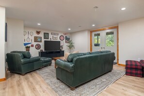 Basement living room ready for relaxation or streaming on Smart TV.