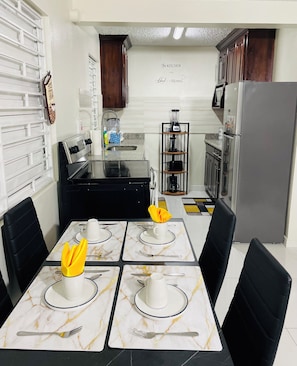 Kitchen to cook your own meals .