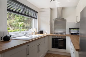 Modern well equipped kitchen. 