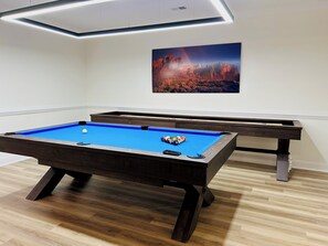 Game room with pool table and shuffle board