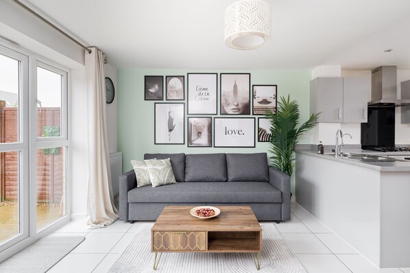 Spacious living area with large sofa bed
