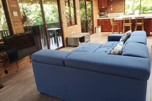 Spacious and Airy living, dining and kitchen, open-plan leading out unto the large balcony.