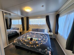 Bedroom set up with Super King bed (can be changed to 2x King Singles on request, with sufficient notice)