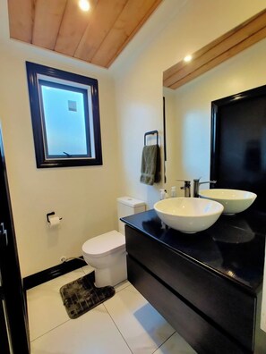 This bathroom is an ensuite off the main bedroom (so guest sleeping in the mezzanine only have access through the bedroom).