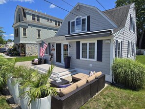 outdoor private seating in front of home