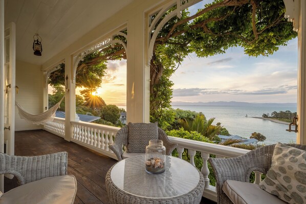 The veranda with spectacular views of Tasman Bay and the mountains beyond