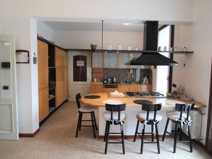 Furniture, Table, Countertop, Chair, Cabinetry, Wood, House, Kitchen, Interior Design, Home Appliance