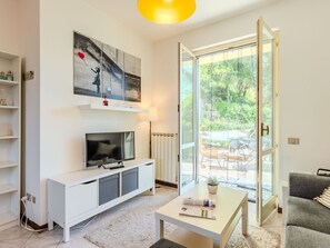 Furniture, Property, Table, Cabinetry, Azure, Couch, Interior Design, Yellow, Shelf, Living Room