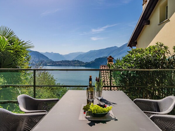 Sky, Water, Table, Plant, Cloud, Building, Furniture, Property, Tableware, Green