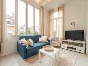 Furniture, Couch, Property, Window, Lighting, Living Room, Wood, Interior Design, Comfort, Floor