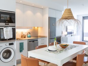 Furniture, Property, Table, Cabinetry, Kitchen, Interior Design, Countertop, Wood, Floor, Flooring