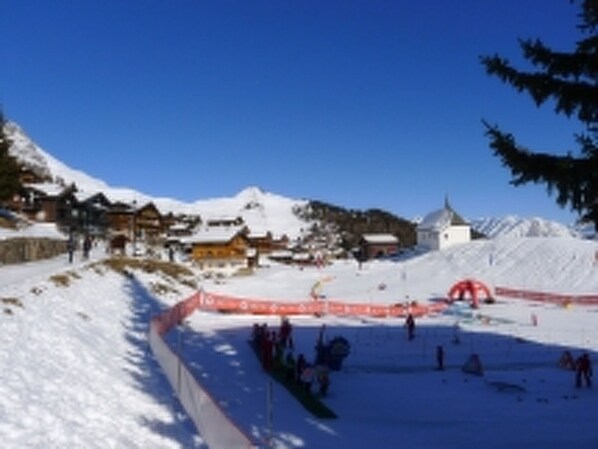 Sky, Snow, Slope, Mountain, Cloud, Tree, Freezing, Glacial Landform, Recreation, Mountainous Landforms