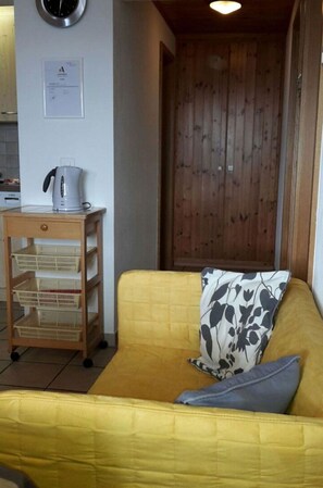Furniture, Flooring, Floor, Interior Design, Wood, Room, Lighting, Wood Stain, Living Room, Couch